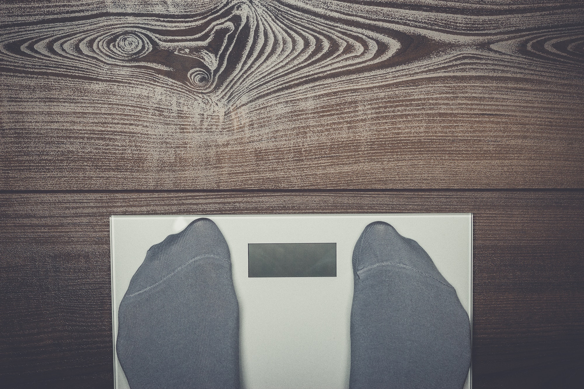 electronic scales on the wooden floor