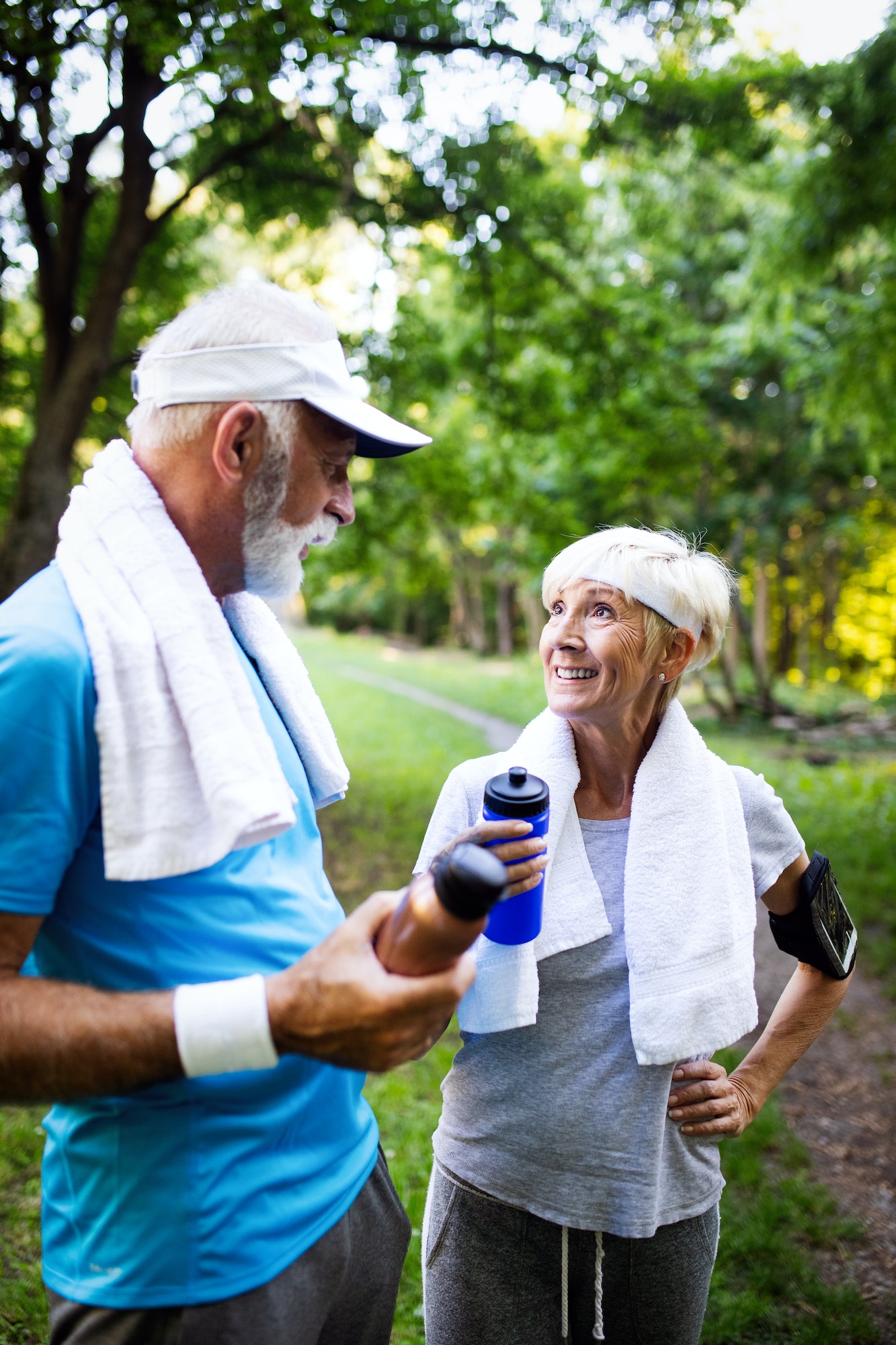 Happy mature people couple exercising for healthy life